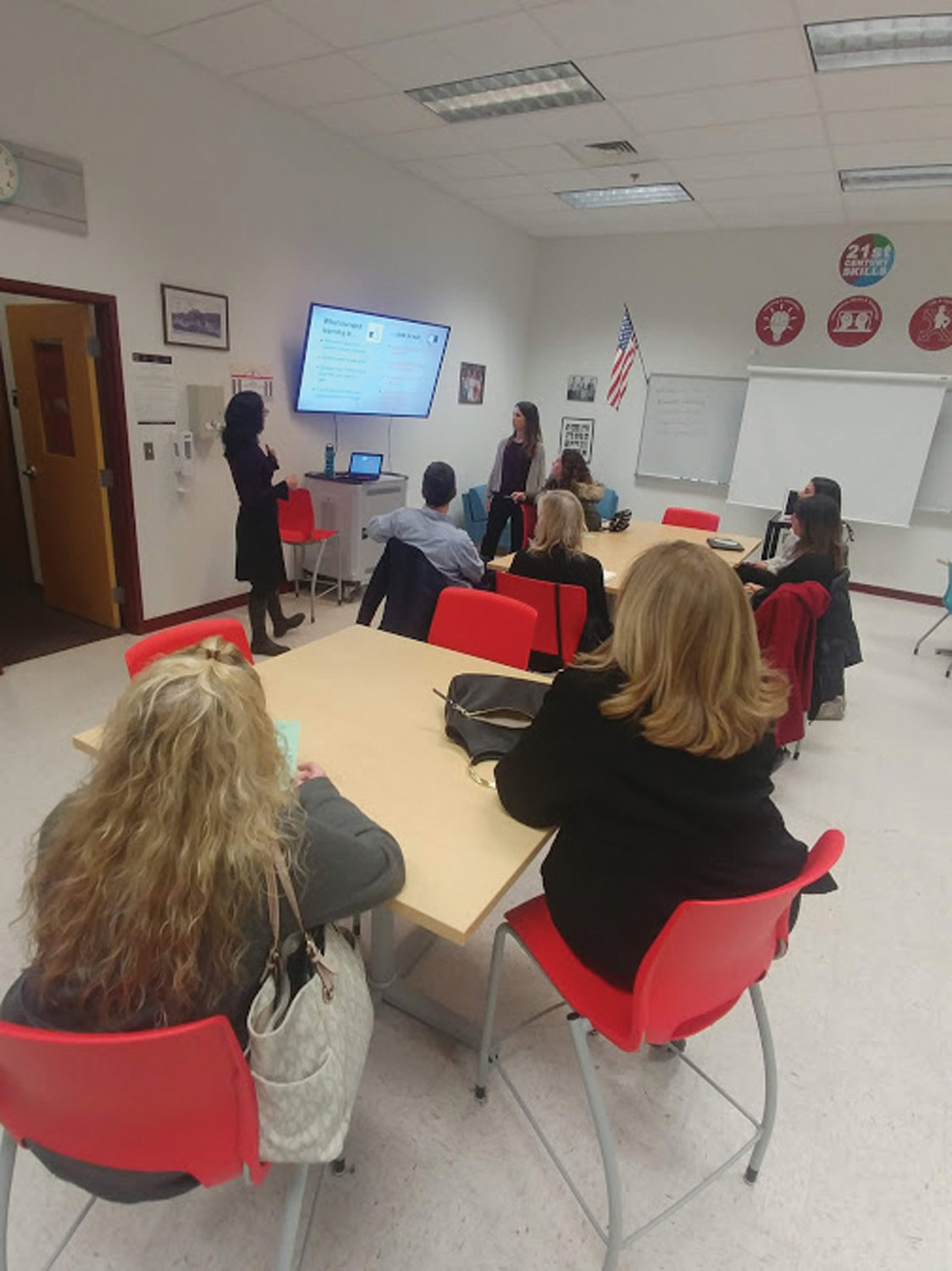 A PERSONAL APPROACH: Two Cranston West educators, Julie Bannon and Kate Ray, helped parents to better understand what Blended Learning is and how it can help educators to personalize their students’ educations.